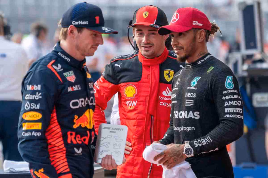 Verstappen, Leclerc e Hamilton nel paddock